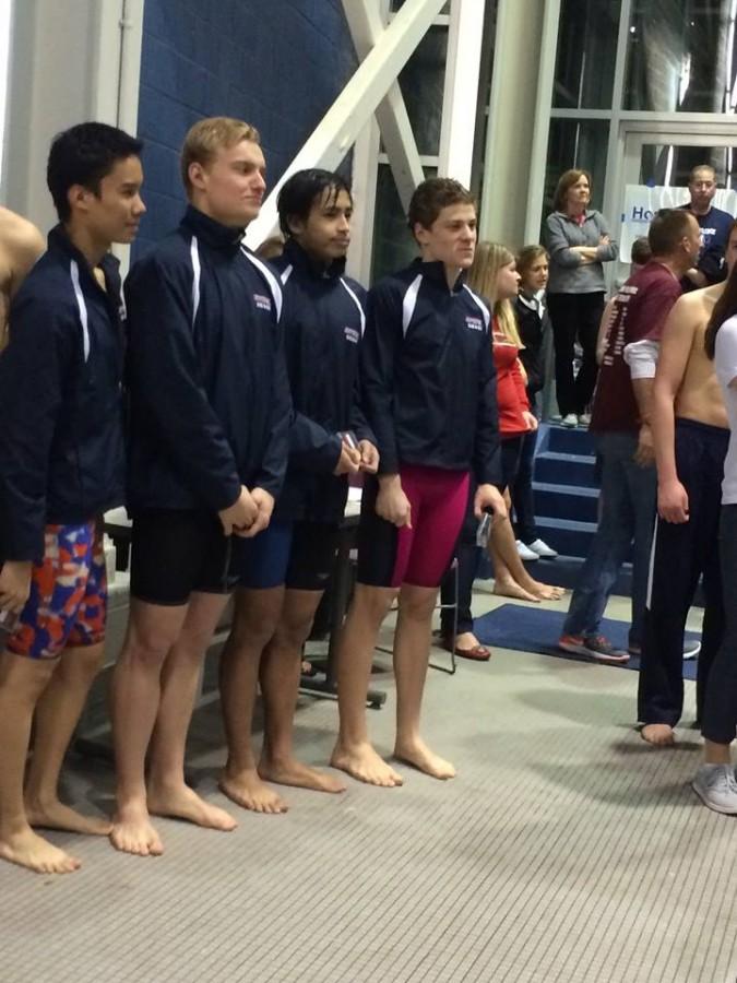 Seniors+Gerry+Wan%2C+Andrew+Seliskar+and+Quintin+Frierichs+and+junior+Emilio+Sison+receive+their+awards+at+the+Regional+Championships.