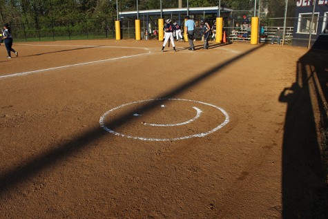 The Jefferson team etched the smiley face into the ground while preparing the field to promote team spirit.