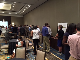 Attendees peruse senior research projects