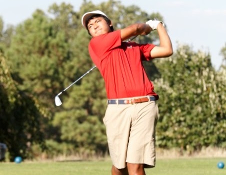 Senior Nathan Chuwait takes a shot in the competition against Thomas Edison HS at the Pinecrest golf course on Sept 17