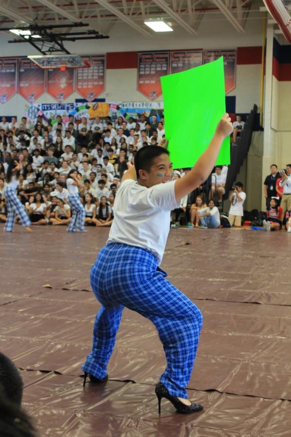 Junior Sean Tran twerks during Juniors MEX. 