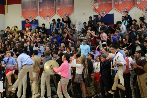 The junior class yells their class cheer during roll call