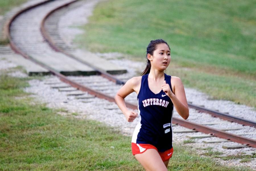 Cross country runner Sarah Kim runs in a race for the last time in her Jefferson career. 