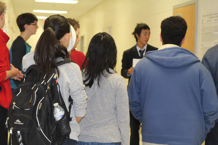 Jefferson students listen to a Japanese exchange student present a research experiment. Japanese exchange students gave presentations all through eighth period on Jan. 6th in the Curie Commons.