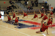 Jefferson dance team performs their routine at the boys basketball and their senior night.