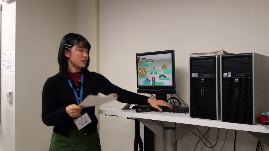 Students from Fudo Oka High School present their own research projects to Jefferson students during eighth period. They utilize a computer near the College and Career Center to show their presentations.