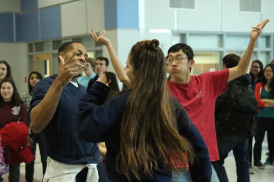 Throughout the week, Active Minds allowed students to play "Just Dance" in the Nobel Commons. Senior Connor Jones, freshman Christina Blake, and senior Adam An use this opportunity to dance to "Get Low," by Dillon Francis and DJ Snake during lunch.