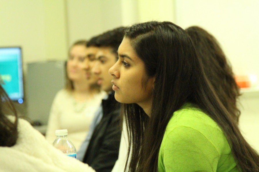 Students took the Active Minds's "End the Silence," eighth period opportunity to listen to speakers and their stories. Sophomore Sai Chodavarapu listens intently as speaker Taylor Johnson tells her story of mental illness.