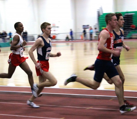 Senior distance runner Nate Foss hung back in the early laps, then overcame his competitors to win third overall in the 1600 meter race.