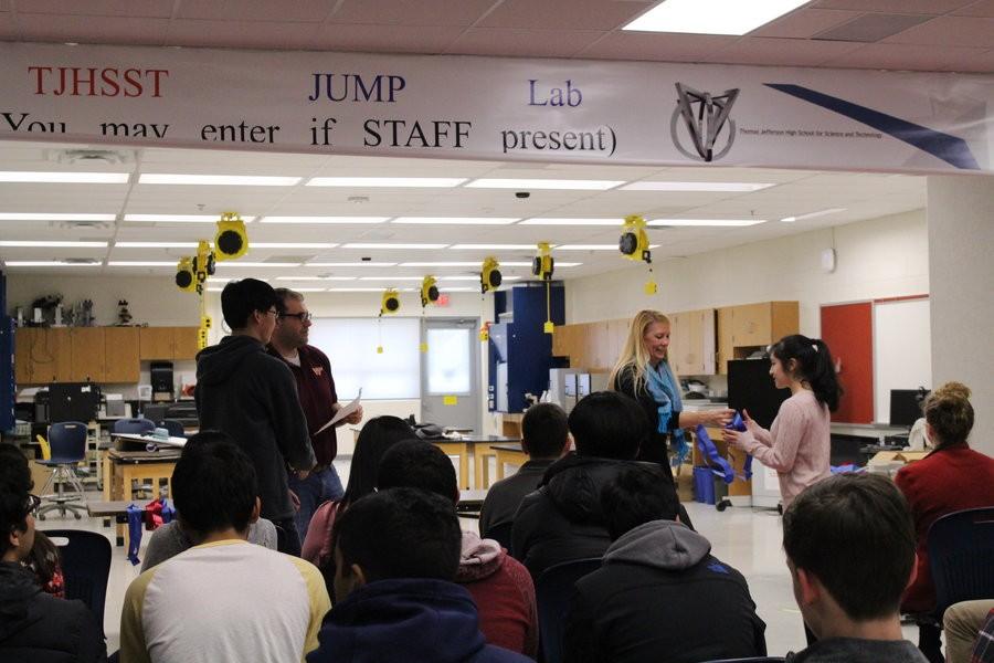 Jefferson students congratulate Katherine Barbano and Eugene Jeong as they are called up to receive recognition and a ribbon for placing first in the Energy: Chemistry category of science fair. The awards ceremony took place in the Da Vinci Commons on February 9th during JLC.