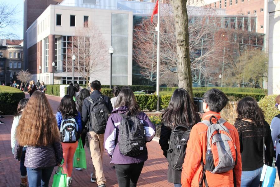 Journalism, broadcast, and yearbook members walk toward Columbia's Alfred Lerner Hall to register for the convention.