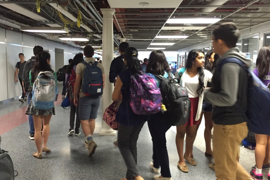 Students walk around the building during the school day. The FCPS school board decided to begin the upcoming school year after Labor day. 