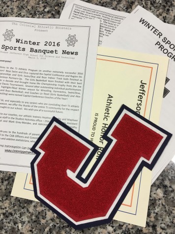 A varsity letter along with one of the certificates and programs students might have picked up at the Winter Sports Award Ceremony.