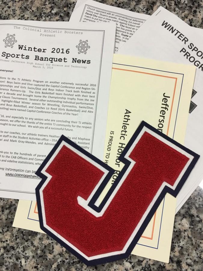 A+varsity+letter+along+with+one+of+the+certificates+and+programs+students+might+have+picked+up+at+the+Winter+Sports+Award+Ceremony.