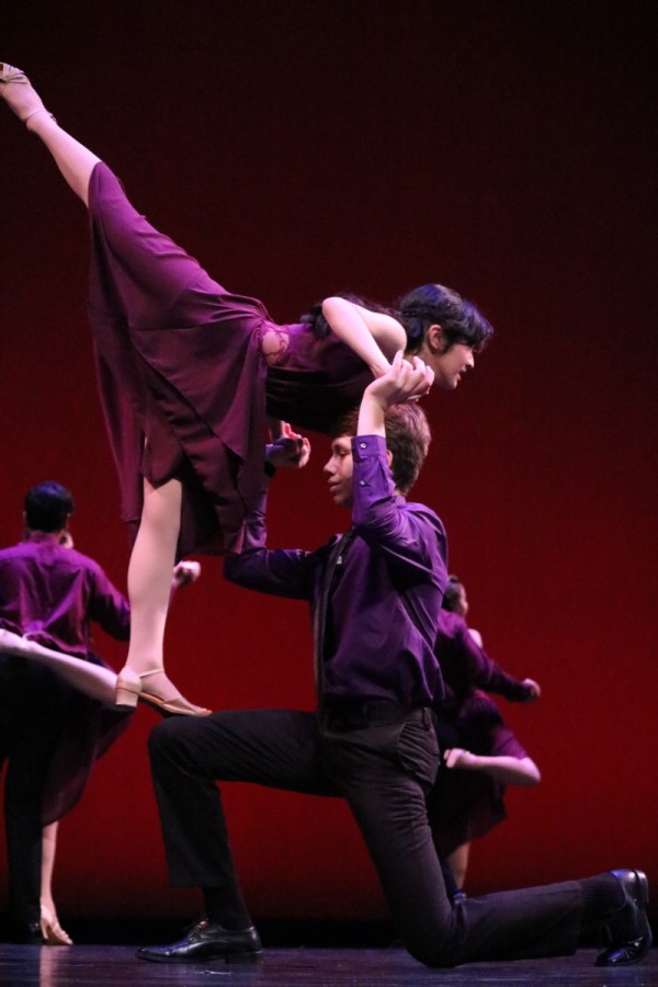 Ballroom captivated the attention of the audience with powerful lifts and stunts like this one, with junior Edward Tyles and sophomore Katherine Barbano.