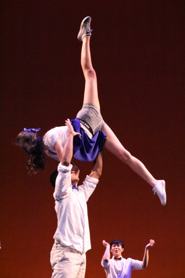 Seniors Cece Xiao and Connor Jones perform an astounding lift during Swing's performance.