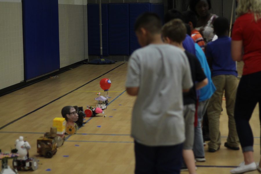 Students+from+Weyanoke+Elementary+School+judge+the+all-iBET+beauty+competition.+Jocelyn+Liu+won+the+beauty+competition+with+her+Wall-E+robot.