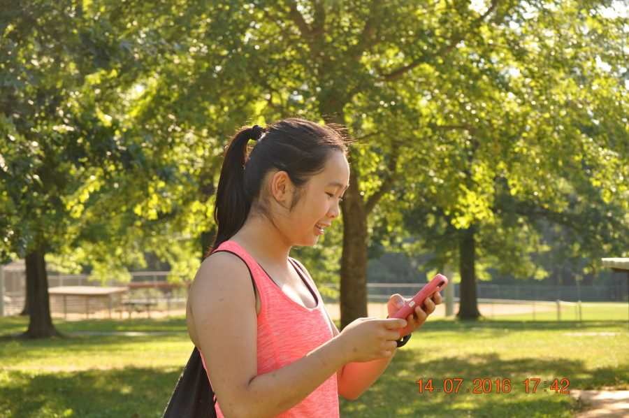 Rising sophomore Anne Nguyen travels in the park in search for more Pokémon