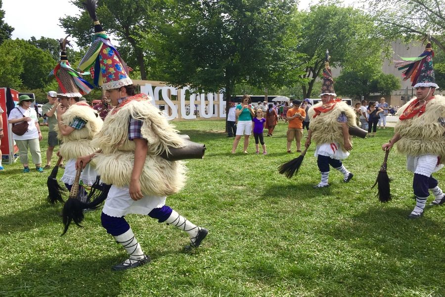 A cultural dance is performed throughout the festival grounds.