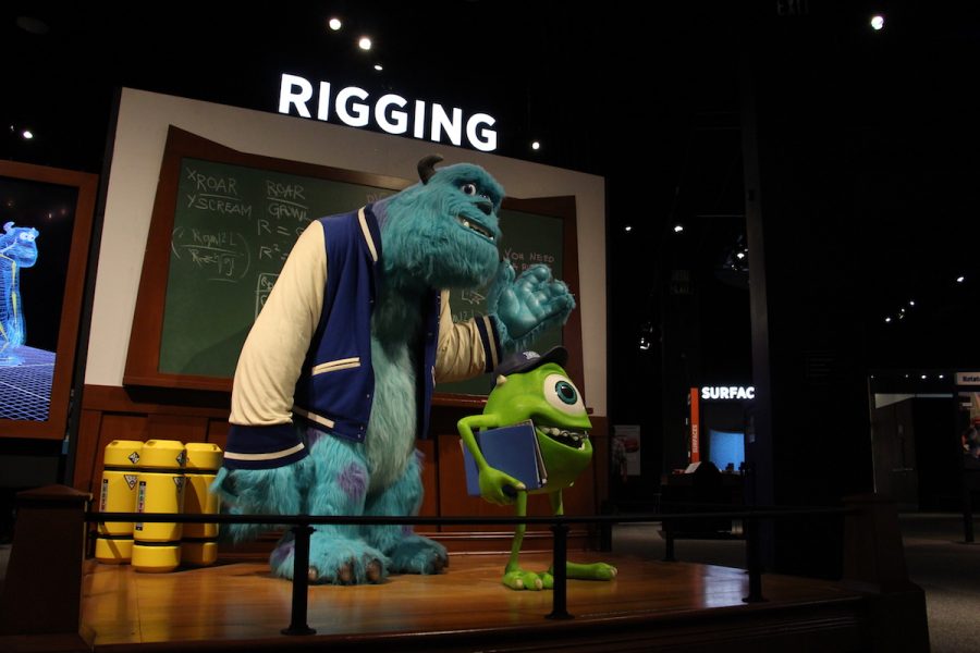 Upon entering The Science Behind Pixar, visitors are greeted by Monsters, Inc characters that demonstrate rigging.