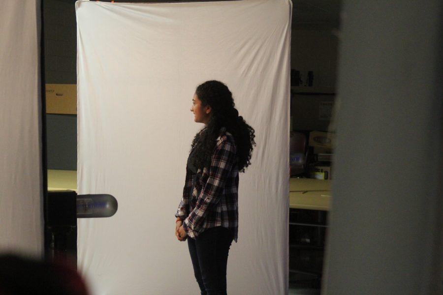 Junior Vaishnavi Nara gets her picture taken.