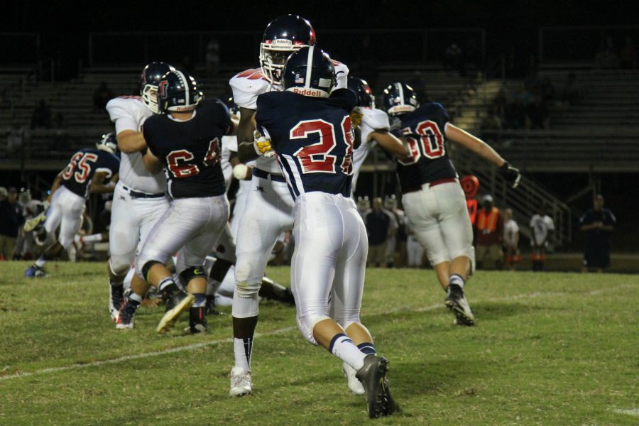 Jefferson Junior Taylor Kim defends against Edison.