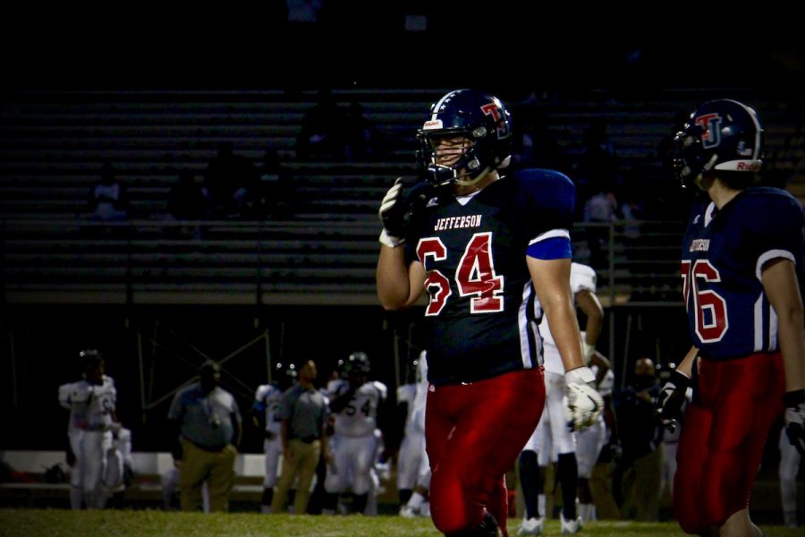 Seniors Ryan Bolton and David Lim play during Jefferson's football game against National Collegiate Prep on Sept. 16.