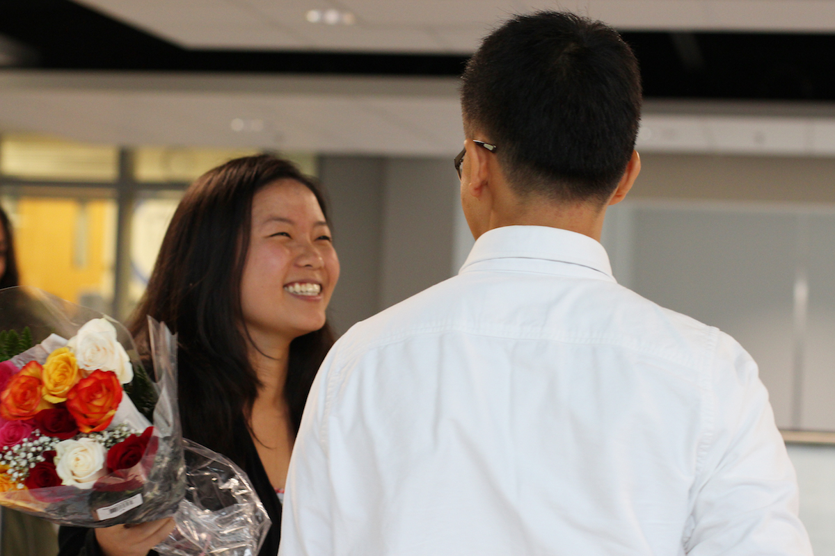 Senior Laura Chu accepts senior Justin Lee's homecoming asking.