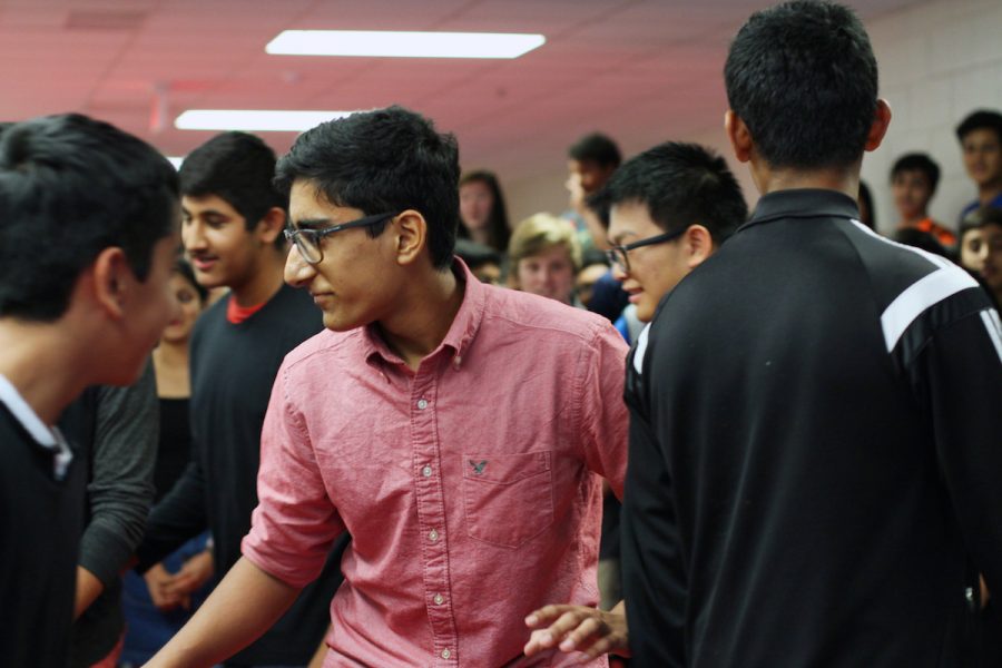 Sophomore Aaron Wadhwa performs with his friends before asking sophomore Stuthi Iyer to homecoming.