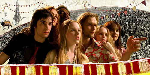 The cast of Across the Universe, a movie with only Beatles songs for the soundtrack, looks forward with the artistic background for the For the Benefit of Mr. Kite! scene. Courtesy of www.popmatters.com