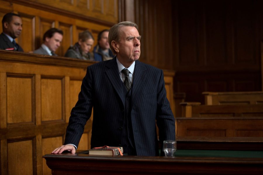 David Irving (Timothy Spalling) defends himself in the courtroom as his own litigant.