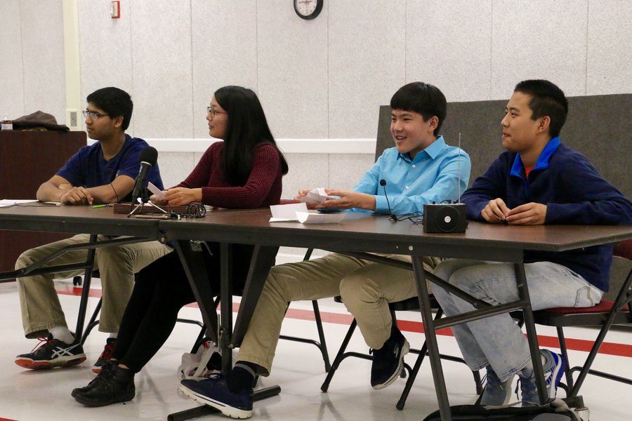 From left to right, Prasad, Tian, Charles Wang, and Franklyn Wang answer a question regarding the skills, outside of science knowledge, gained from competing in Olympiads. Franklyn Wang cited determination, while Tian elaborated on the "easy, trusting relationships" she has developed.