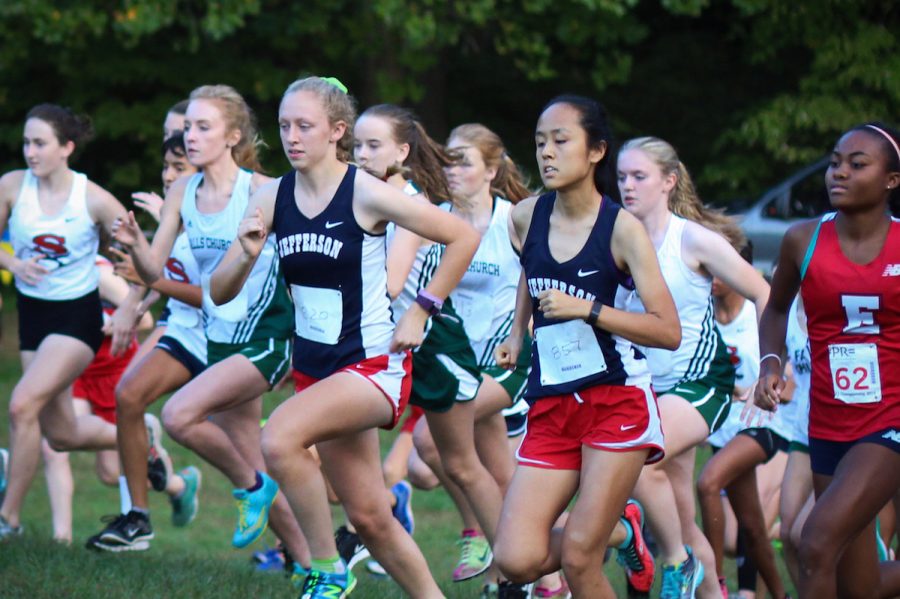 Juniors+Margaret+Covey+and+Sherry+Xie+begin+their+race.