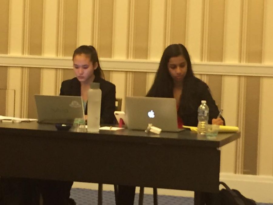 Boojala and Min review their research during the semifinal round of the Capitol Classic tournament on Oct. 24.