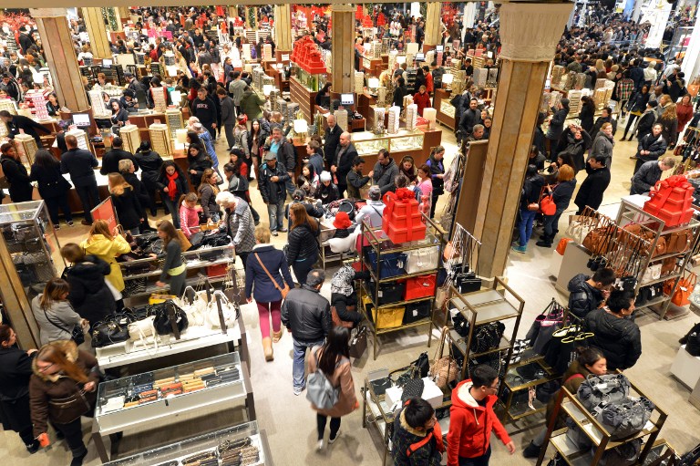 Shoppers break open their wallets at Macys on Black Friday, the beginning of the holiday shopping season.
