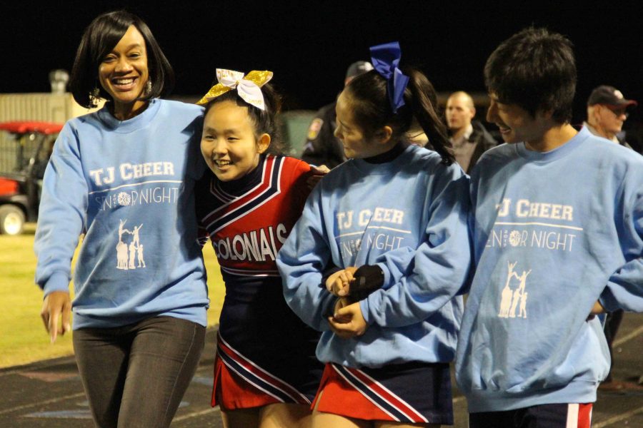 Senior Sharon Kim is accompanied by her coach, Carolyn Leary, and fellow teammates junior Lilly Ko and sophomore Richard Wang.