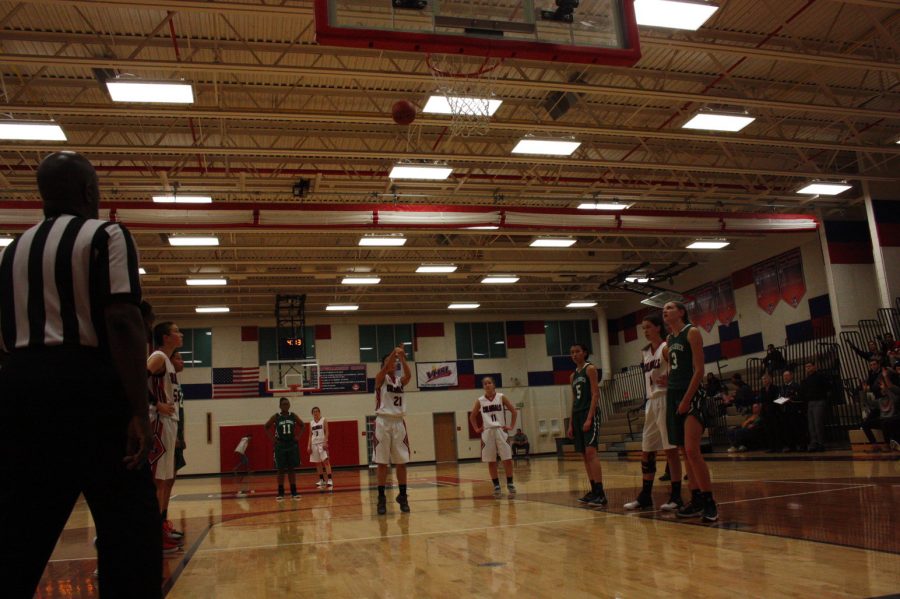 Freshmen Abby Kim takes 2 free throws in hopes to decrease the Jaguars lead.