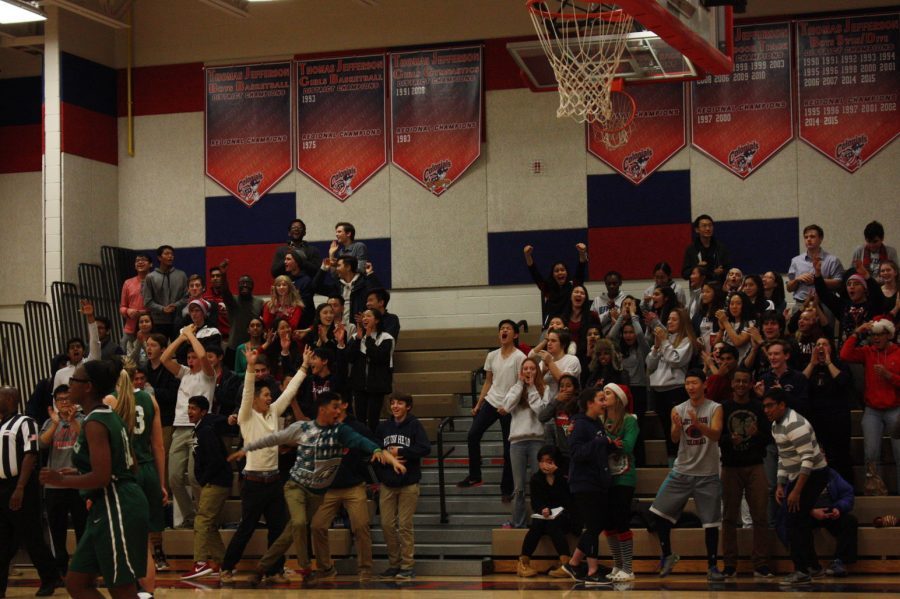 The Monticello Maniacs cheer on the Colonials.