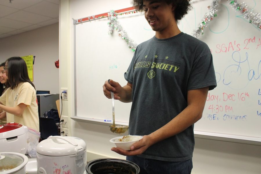 Joshua O’Cain makes curry rice.