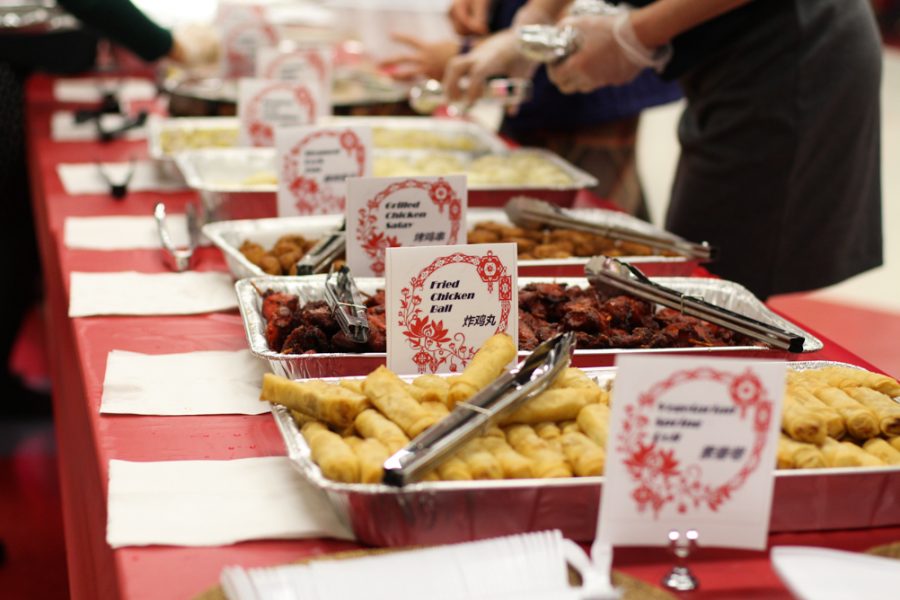 Chinese food is set out for attendees. 