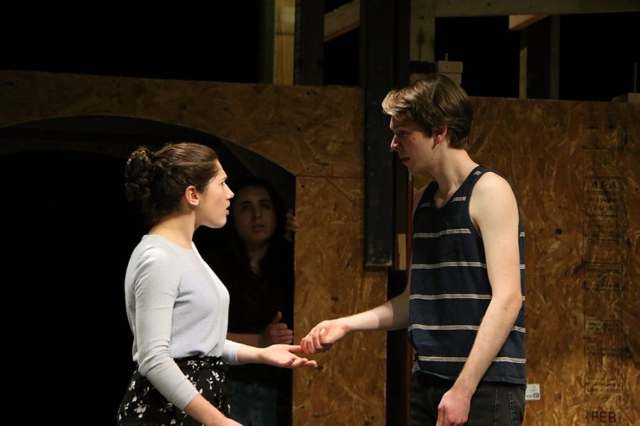 Jennifer Steele, who played Éponine, and Evan Strong, who played Marius Pontmercy, rehearse a scene from “Les Misérables” before the show. Photo courtesy of Patty Vitsupakorn.