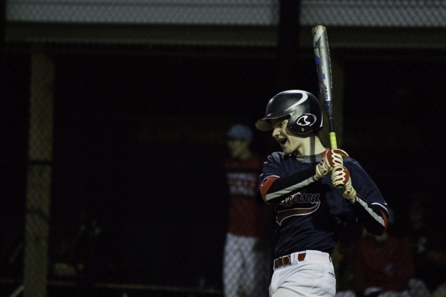 Freshman Ryan Berry swings the bat.