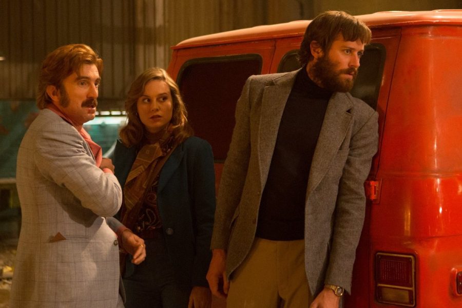 Vernon (Copley), Justine (Larson) and Ord (Hammer) hide behind a van. After premiering at the Toronto International Film Festival in late 2016, “Free Fire” saw its general U.S. release on Apr. 21.