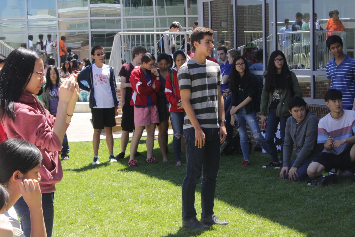 The crowd looks on as junior Nick Begotka is asked in the new courtyard.