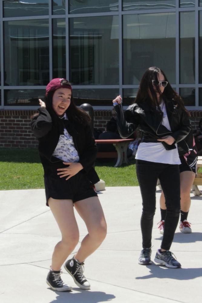 Juniors Linda Diaz and Nina Chung dance to a K-pop song. they asked juniors Jadon Schuler and Frank Ding, respectively.