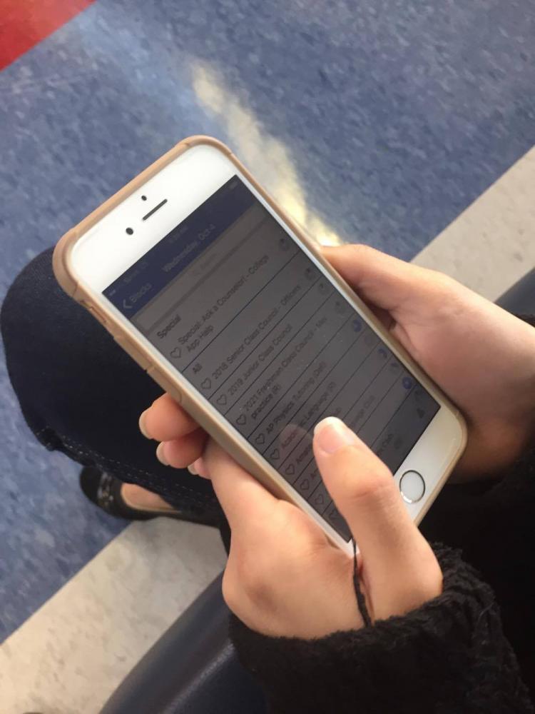 A student signs up for eighth period using the TJ Intranet App. 