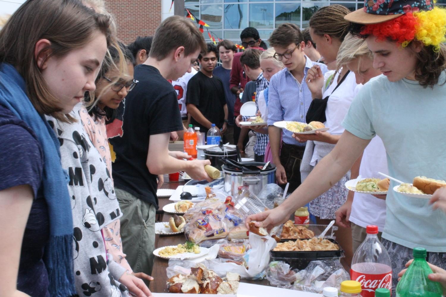 Jefferson students and their German exchange students set up in line for the Oktoberfest food, provided by the German Honor Society members.