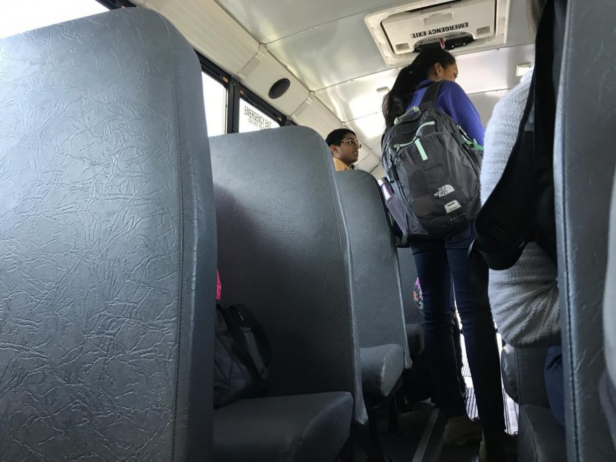 Students took their seats after school on a school bus that goes to Loudoun County.
