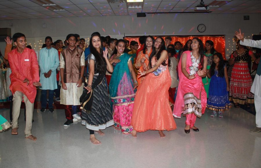 Attendees of the Diwali celebration during an impromptu dance-off pitting underclassmen against upperclassmen.