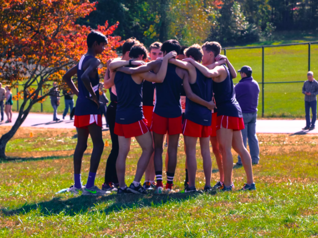 Huddled+together%2C+Cross+Country+athletes+chant+the+maxim+%E2%80%9CI+Believe+That+We+Will+Win%E2%80%9D.+On+Oct.+17%2C+with+the+annual+district+conference+promptly+approaching%2C+Jefferson+sprinters+energize+their+spirits+through+optimism+and+reassurance+for+their+impending+mark+of+success.+